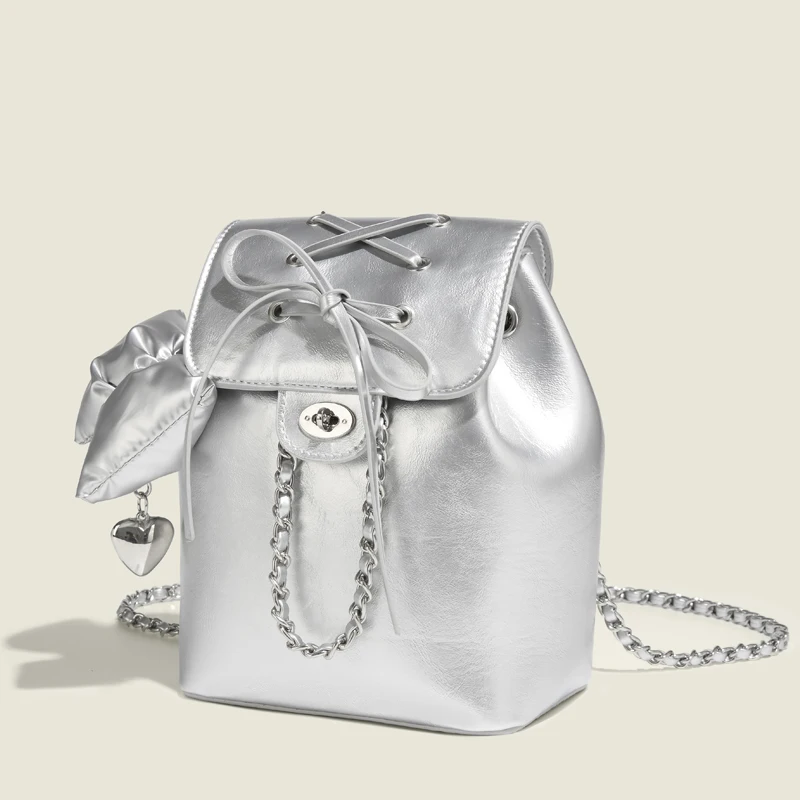 thumbnail image 1 of Mochilas casuales coreanas para mujer, bolsos de mano de diseñador de lujo, monederos, novedad de 2024, en PU plateado, cadena con cierre, lazo, adornos colgantes para el hombro, 1 of 5