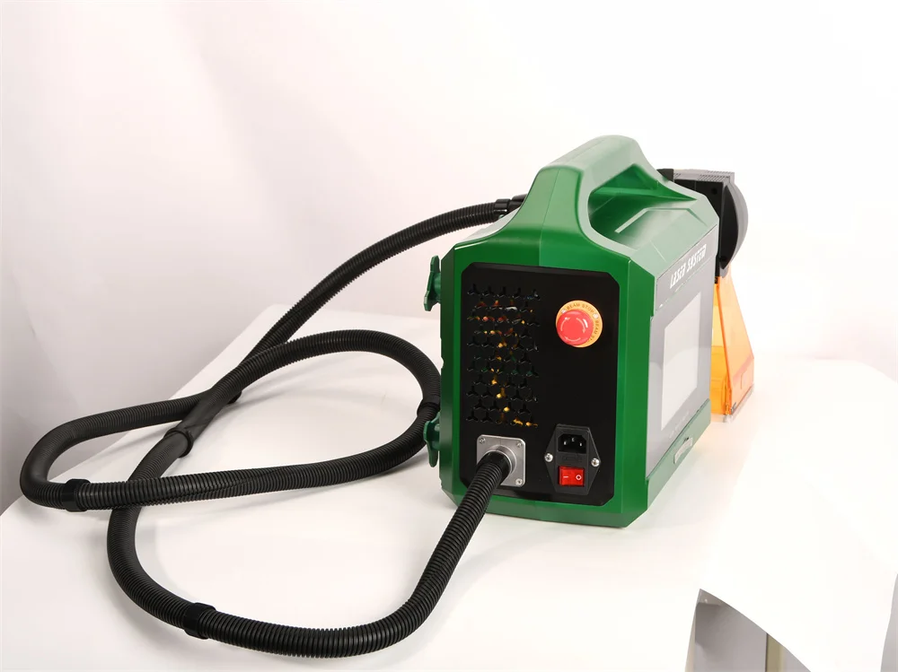 Hand held metal engraving machine