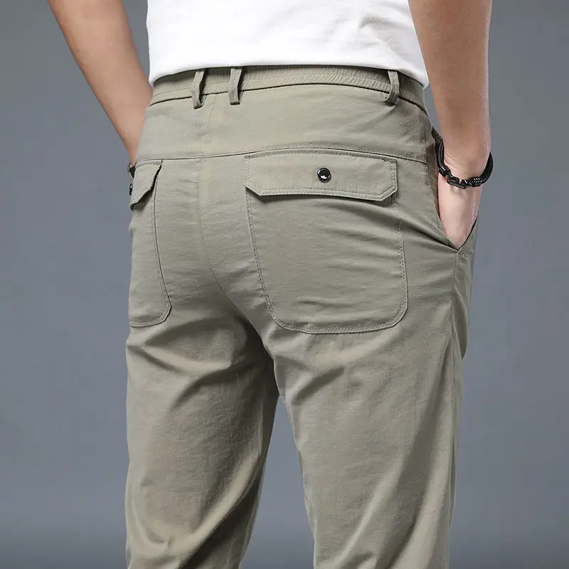 Léto nový ležérní versatile korejské edice módní přímo kalhot muži celistvý elastická pás stahovací kapsa hubený sportovní kalhoty