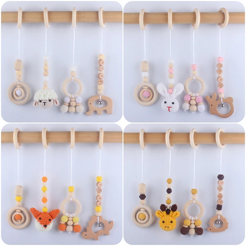 

Baby Beech Hanging Pendants 4pcs/set Knitting Doll Ring Teether Teething Nursing Rattle Toy for Stroller Gym Newborn Baby Shower