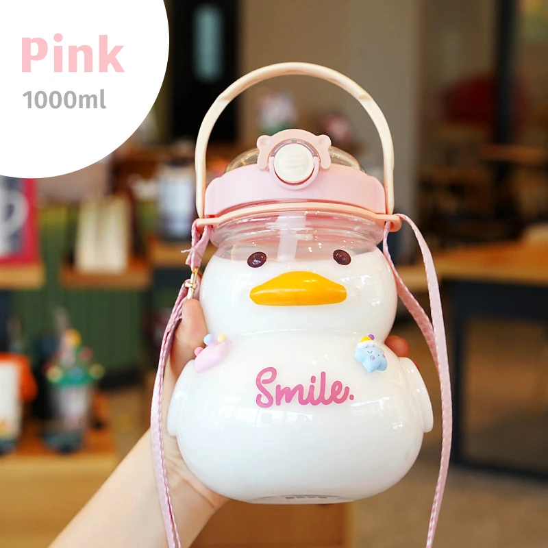https://ae01.alicdn.com/kf/S132601d40c034d15819eb9cff6a6f7c5z/1000ML-Cute-Duck-Water-Bottle-with-Strap-Straw-for-Girls-Plastic-Cup-Fitness-Drinking-Bottle-Kids.jpg
