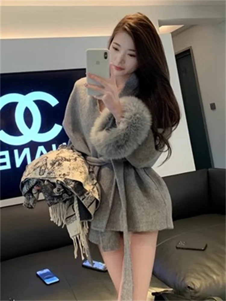 그레이 타이 허리 컬렉션 모직 코트 여성 가을, 겨울 2025 새로운 긴 소매 느슨한 하이 엔드 케이프 코트 중간 길이 탑