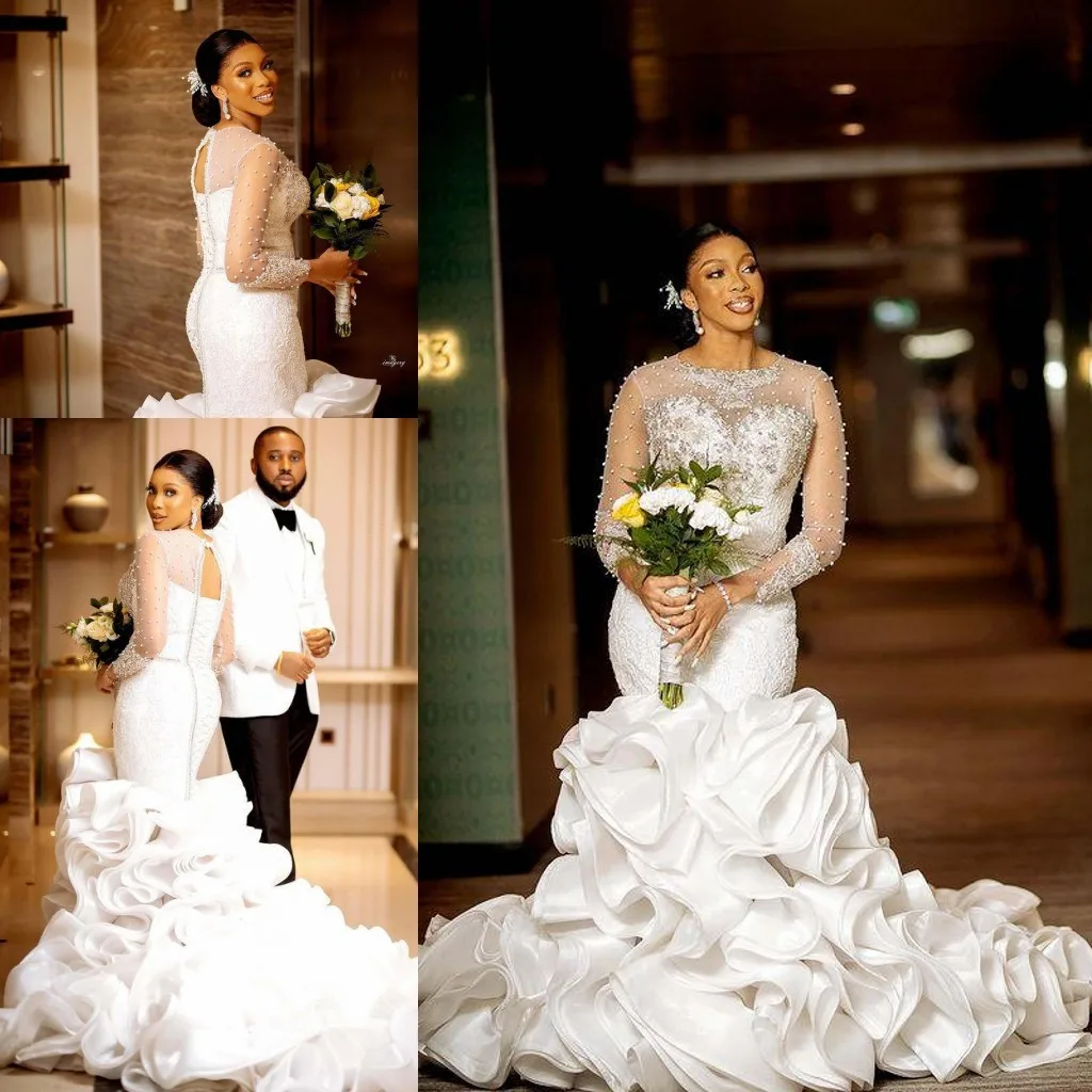 

Luxury Handwork Pearls Mermaid Wedding Dress 2023 Sweep Train Long Sleeves Appliques Beaded Open Lace-up Back Bridal Gowns