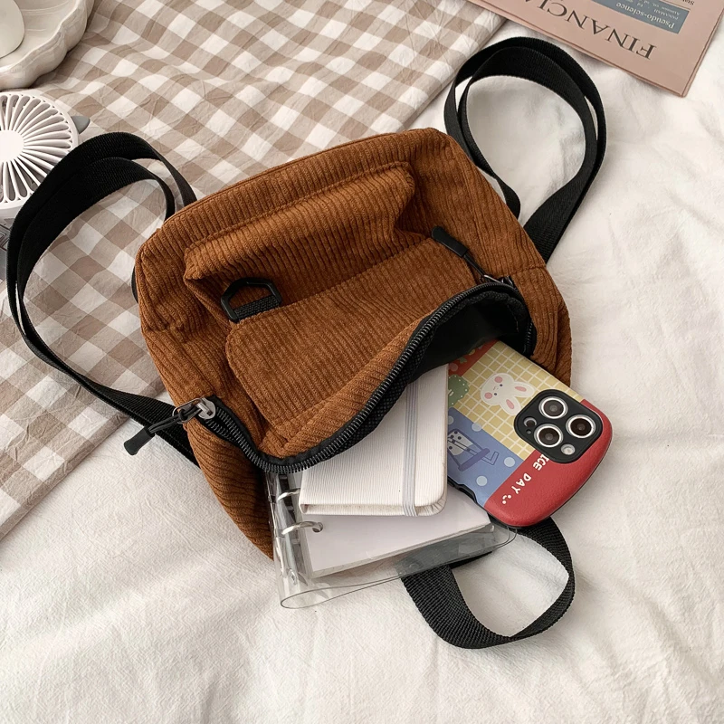 Mini sac à dos en velours rayé minimaliste et polyvalent pour étudiants et femmes pour les voyages de loisirs