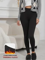 Plus Size Thermal running leggings with fleece interior for women. design provides warmth and comfort for winter and workouts