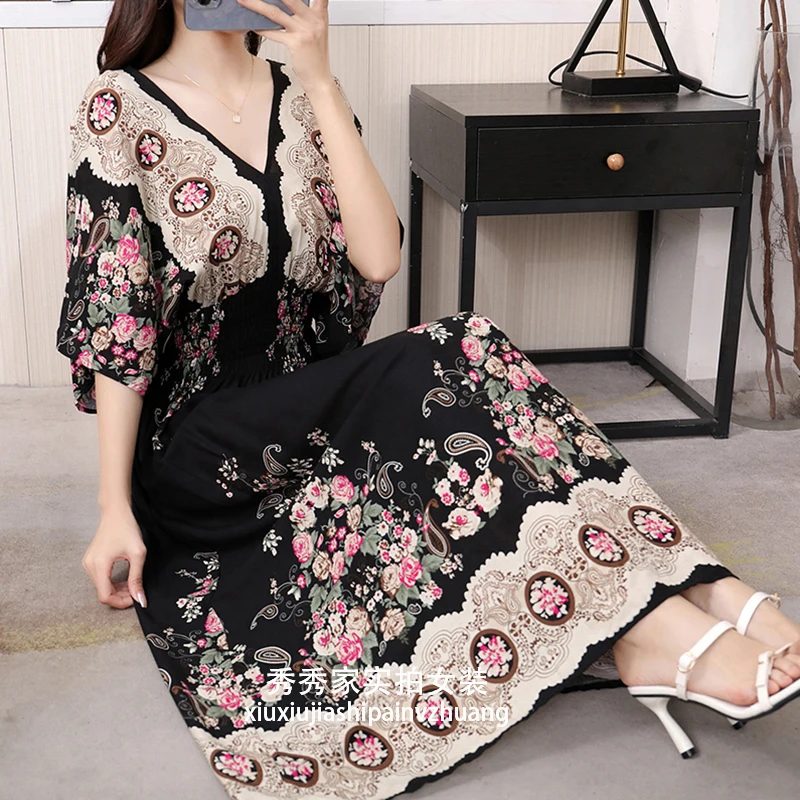 N rose on black background