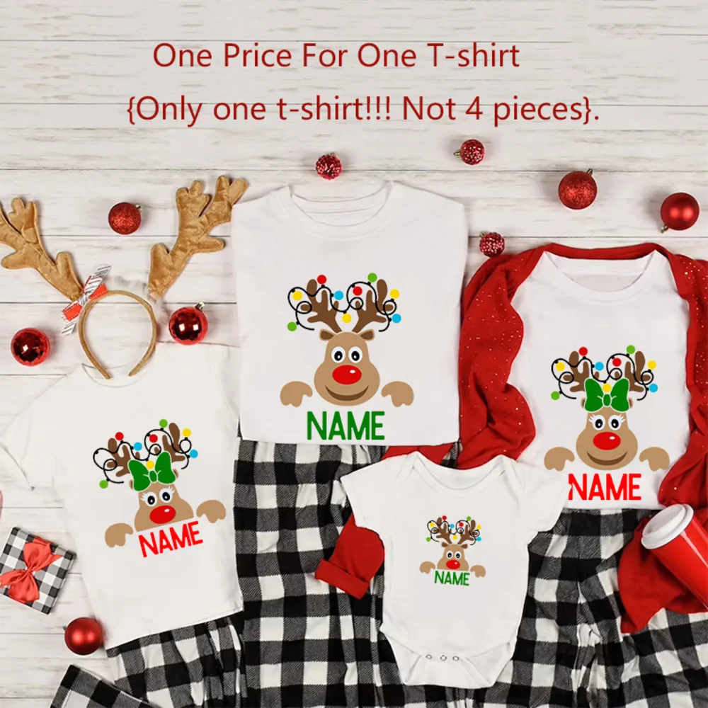 thumbnail image 1 of Camiseta navideña familiar de renos Camisetas navideñas familiares personalizadas Camiseta personalizada con nombre de papá, mamá, niño y bebé Ropa de regalo de Navidad, 1 of 5