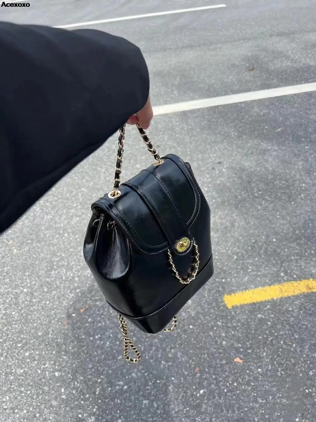 

Waxed leather shoulder bag for women