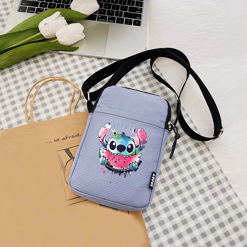 thumbnail image 1 of 2024 Disney Lilo & Stitch Bolsos de pecho para mujer Bolso de hombro Bolso de lona Lindo bolso de compras para exteriores Bolsos de mano cruzados Bolso de mujer, 1 of 5