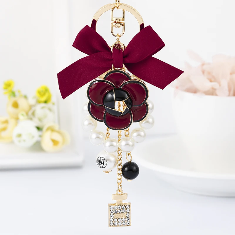 2022 new fashion Traditional Luxury Accessories Glitter Keychain Clover Camellia Lucky Keychain Wedding Gifts for Guests - Image 3