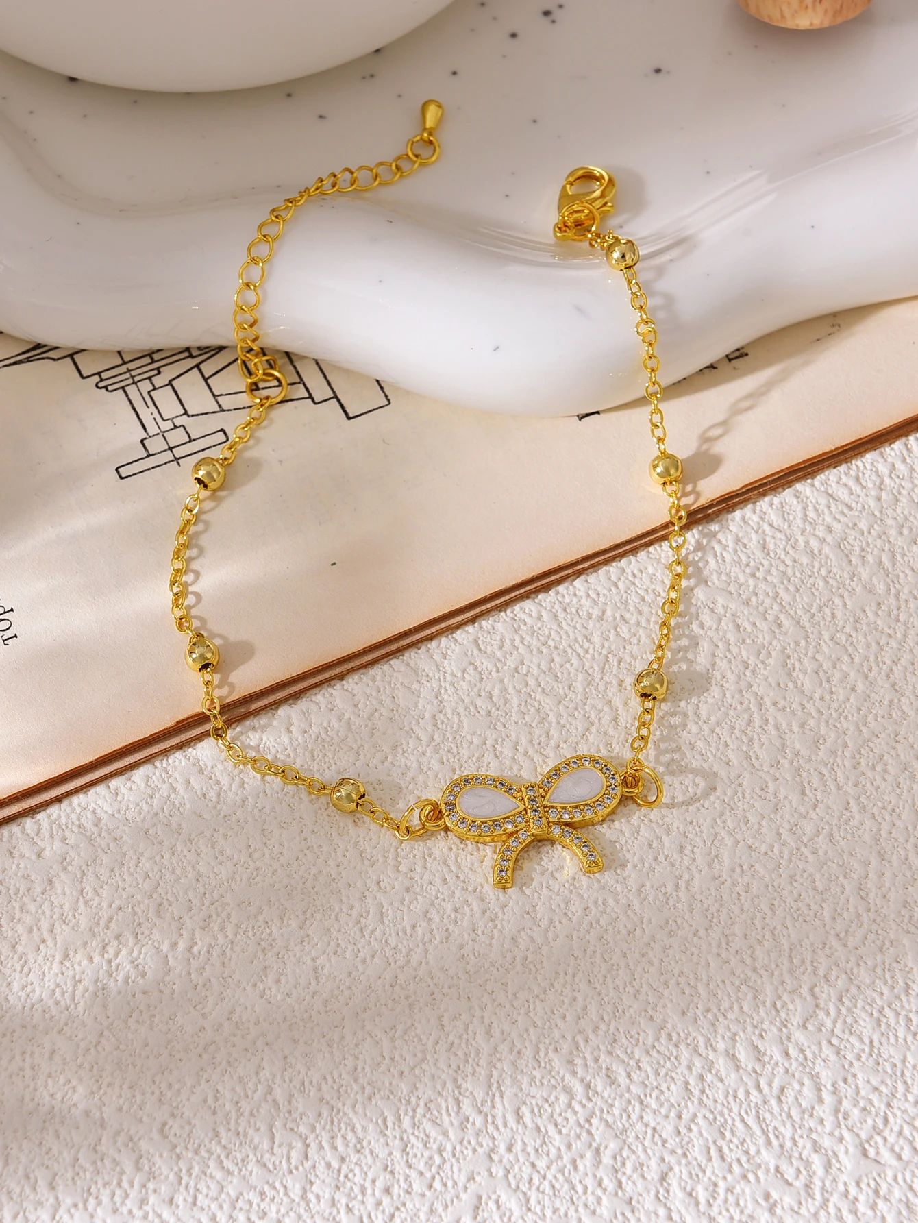 

Милая и элегантная медная циркониевая оболочка с бантом, подвеска из бисера, женский браслет на запястье, модный подарок для девушки на каждый день