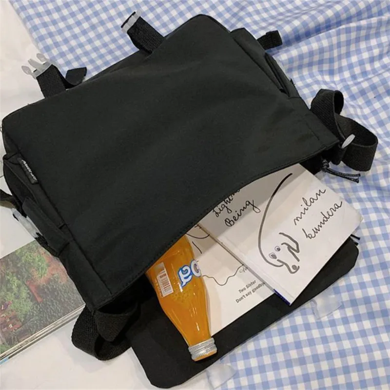 Large capacity student class crossbody canvas bag, women's versatile new Japanese Harajuku solid color mailman shoulder tote bag