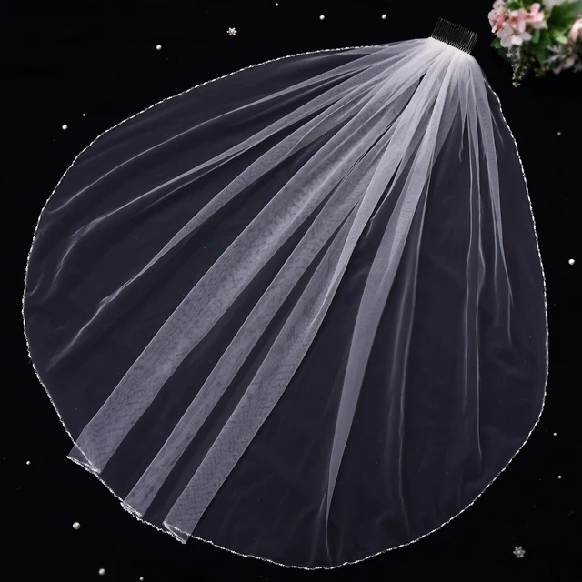 Produktbild von LOVFOIVER Hochzeitsschleier Fingerspitzenlänge - Mit Kristallperlen & Kamm, Eleganter Brautschleier