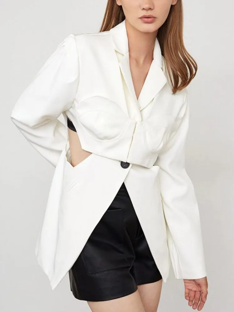 KBQ Spliced Button Hollow Out Split Blazer For Women Notched Collar Long Sleeve Patchwork Pocket Slimming Chic Blazers Female