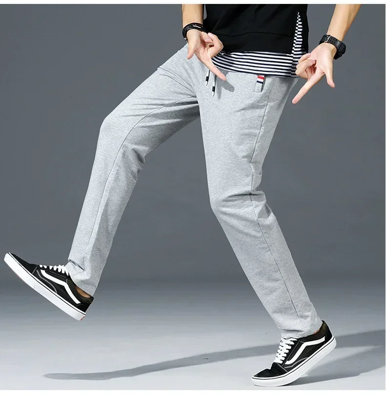 Spring Pants Men Fitness Sportswear Tracksuit Elastic Waist Sweatpants Cotton Trousers Loose Gyms Jogger Track Pants Mens M-8XL sport jogging trousers