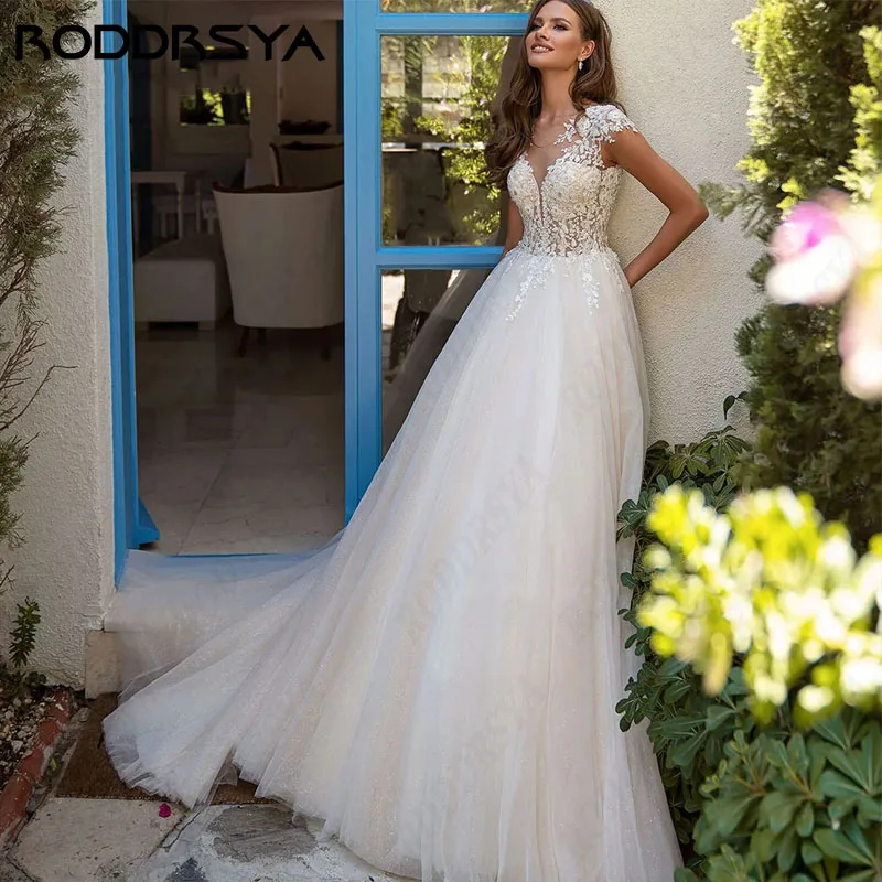 

RODDRSYA Elegant Cap Sleeve Wedding Dress A-line Illusion Button Back vestidos de novia For Women Boho Scoop Tulle Bridal Party