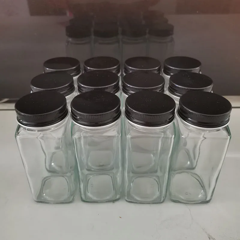 https://ae01.alicdn.com/kf/S1444641b764542cb827168e0e6d30862t/12pcs-Seasoning-Bottle-Set-4oz-Square-Spice-Jars-Black-Silver-Aluminum-Wood-Lids-Jar-Kitchen-Barbecue.jpg