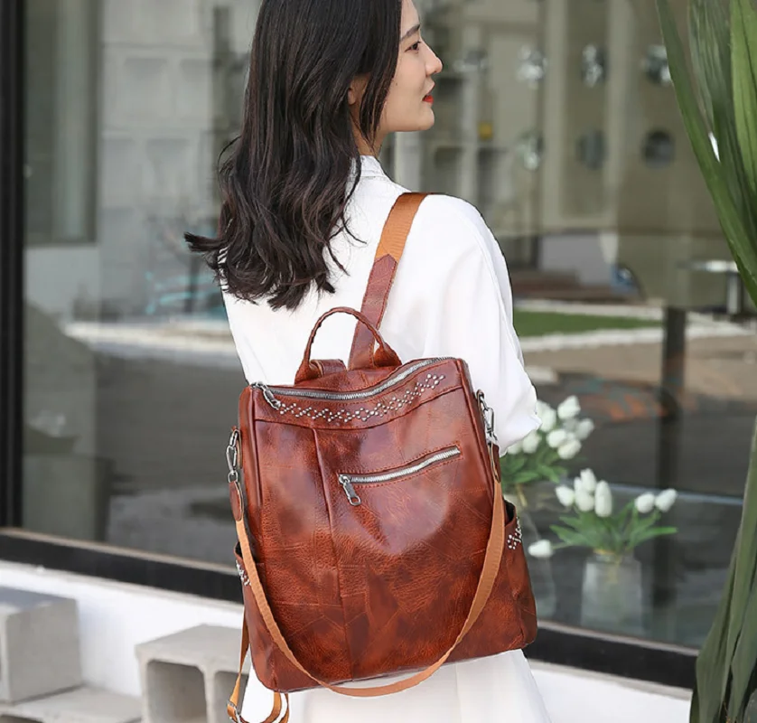 

Hot Sale Women's Soft Leather Fashion Trend Rivet Backpack Large Capacity Double Shoulder Bags Casual Travel Handbag Backpacks