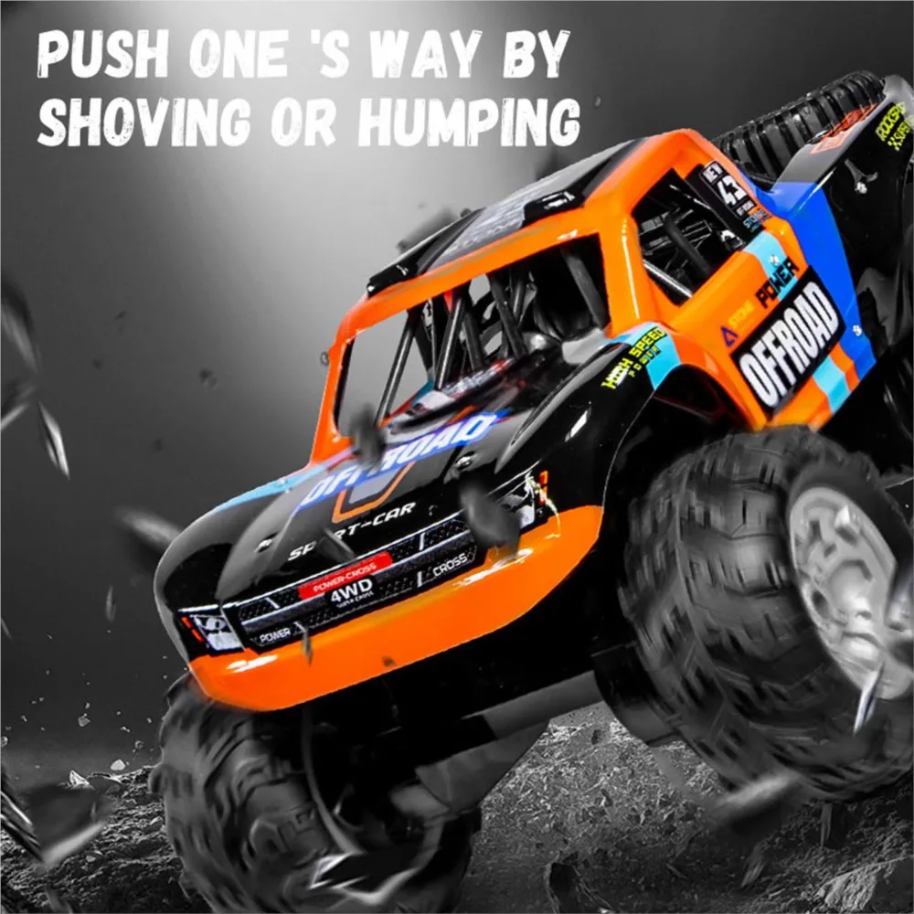 Vue de dessus de la voiture RC tout-terrain 1/14 amphibie 4x4 télécommandée - JJRC Q205 RTR avec sa batterie 7.4V