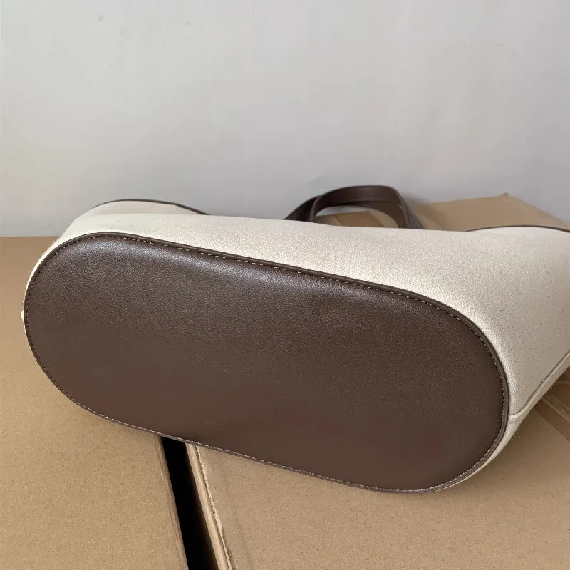 2025 Fashion Versatile PU Canvas Bucket Shoulder and Crossbody Bags Simple Casual Sense of Luxury Retro Handbags for Women