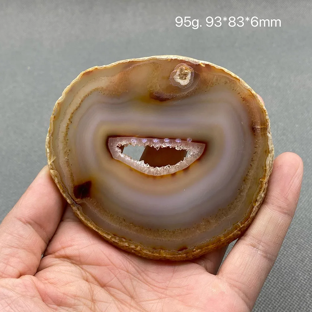 Natural agate slice polished ore specimen with crystal hole
