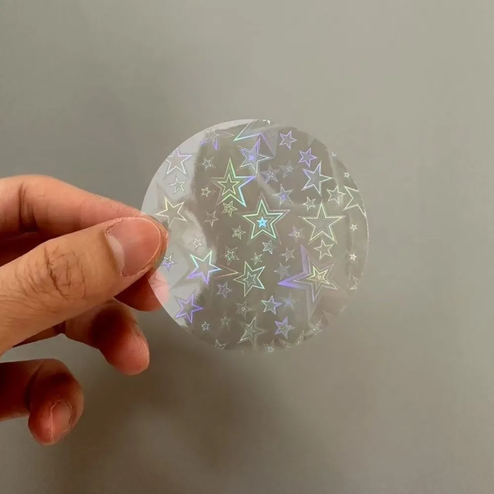 100 Stück runde Laserfolien-Abzeichenabdeckungen aus PVC, mehrere Stile, transparente Abzeichenfolie, Sternmuster, DIY-Herstellung – Detail 2