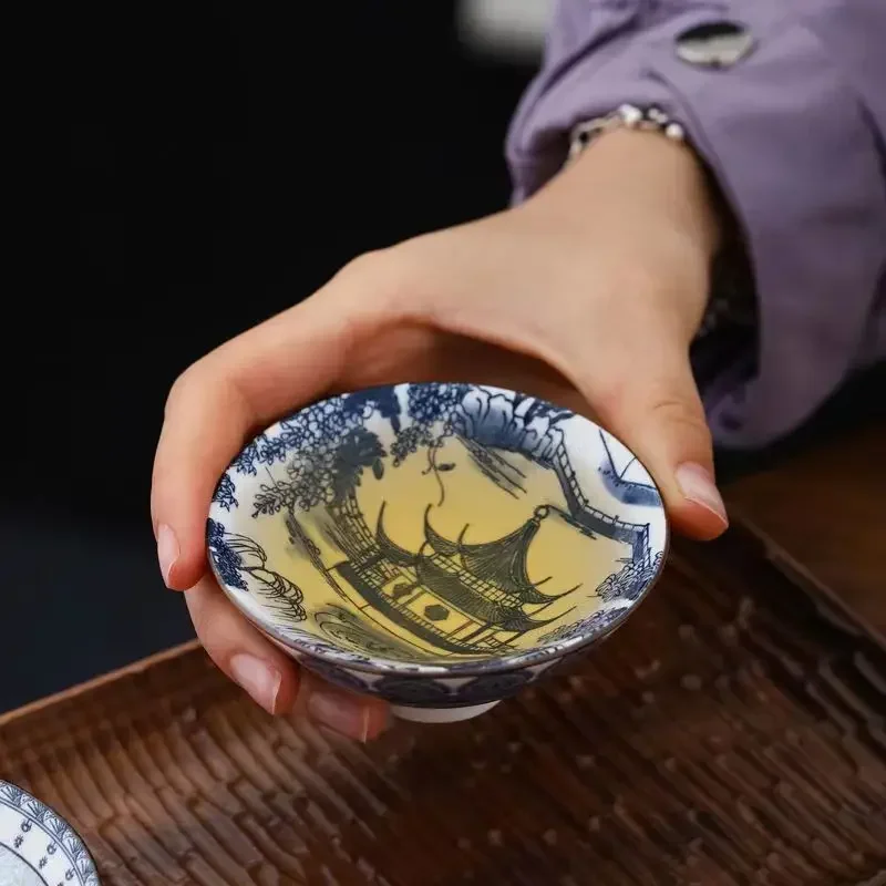Handcrafted Blue & White Porcelain Teacup - Dragon, Phoenix, and Pavilion Design