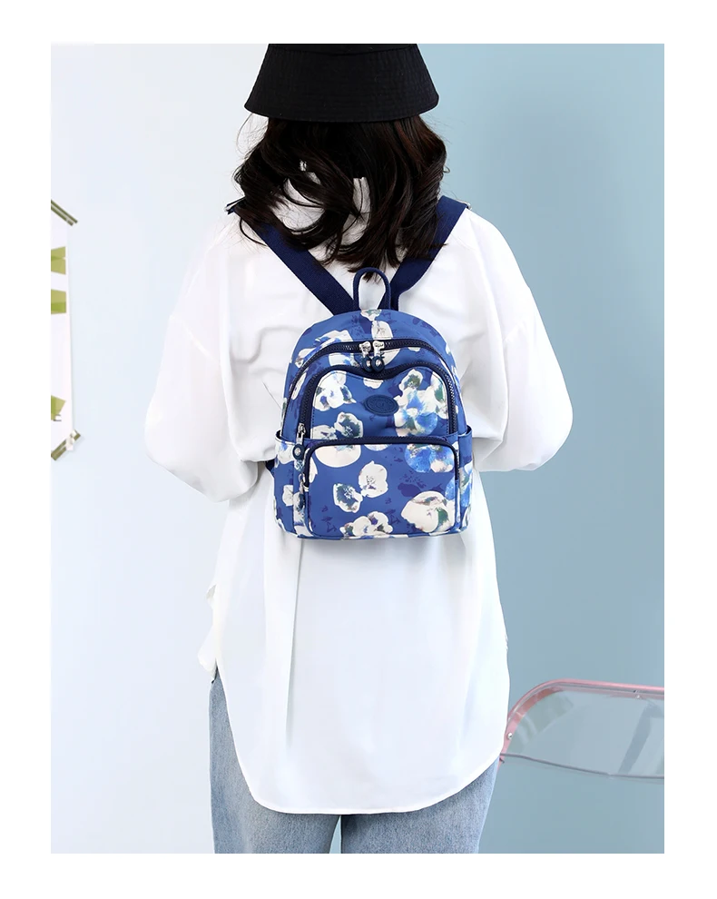 2022 Spring New Candy Color Ladies Backpack Waterproof Nylon Travel Backpack Young Girl School Bag Mobile Phones Bag Mochilas