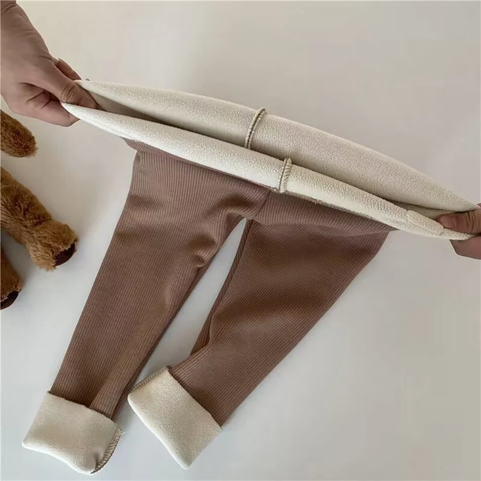 Coreano Otoño Invierno nuevos niños Leggings de una pieza Unisex niños niñas bebé frío evitar caliente dibujos animados elásticos pies atados pantalones - Imagen 5
