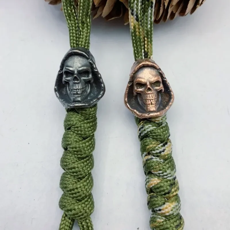 

Grim Reaper Skull Head Knife Beads Handmade Lanyard Pendant Metal Brass Outdoor EDC Tool DIY Paracord Woven Hangings Accessories