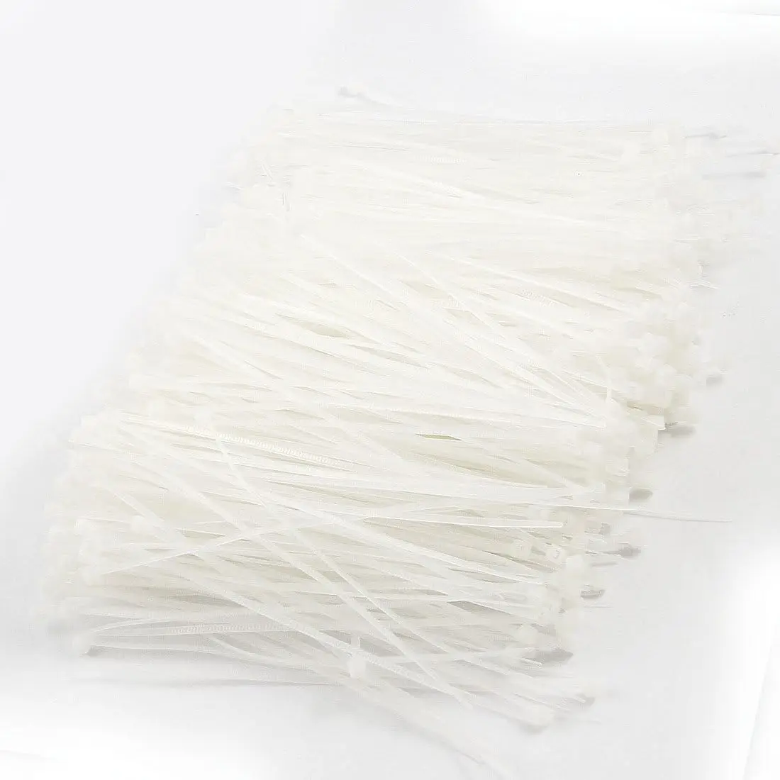 

Tcenofoxy 1000 Pcs White Plastic Cable Zip Tie Fasten Wrap 75mm x 2mm
