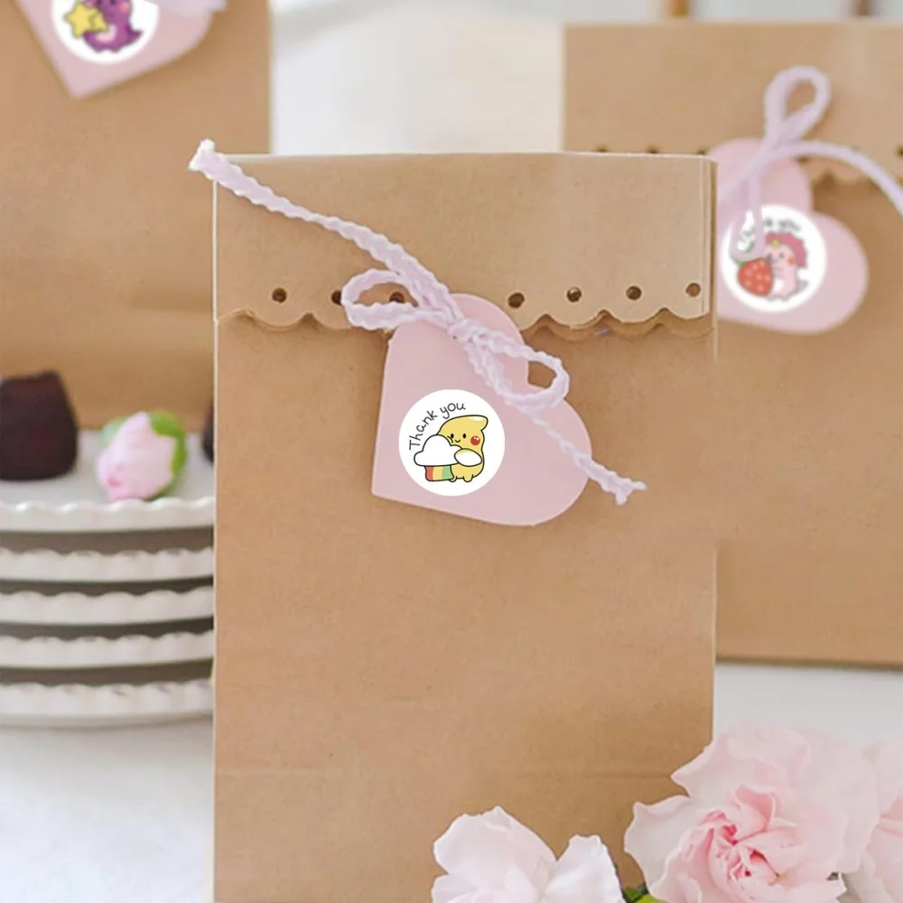 Close-up of dinosaur thank you label designs