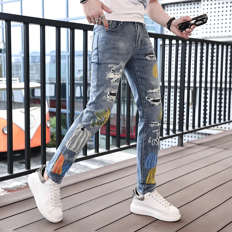 Summer thin section of light luxury street personality fashion printing hole jeans men's casual Slim long tight men's pants