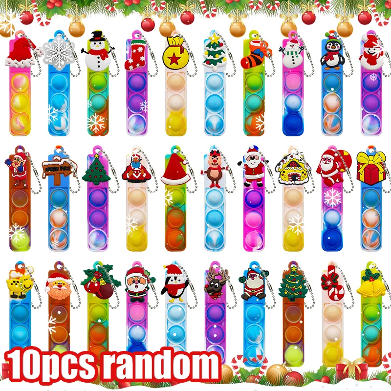 thumbnail image 1 of Nuevos regalos de Navidad, muñeco de nieve, Papá Noel, árbol de Navidad, coches de juguete, llaveros, anillos, cubos mágicos para los dedos, juguetes de Navidad para niños, 1 of 5
