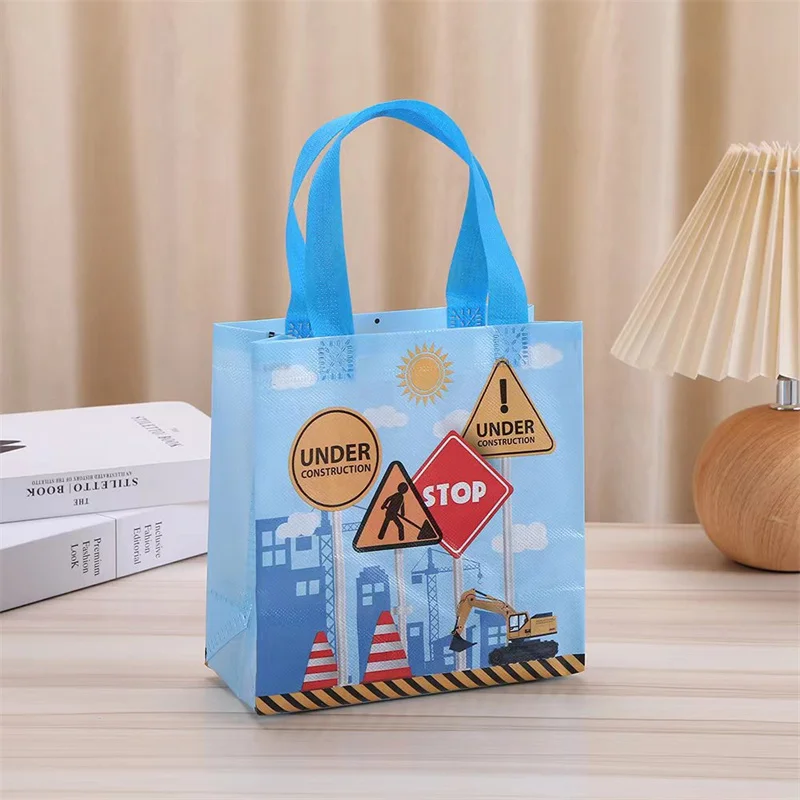 StoBag 24pcs Wholesale Cartoon Non-woven Tote Bags Fabric Gift Package Kids Child Waterproof Storage Reusable Pouch Party Favors 4