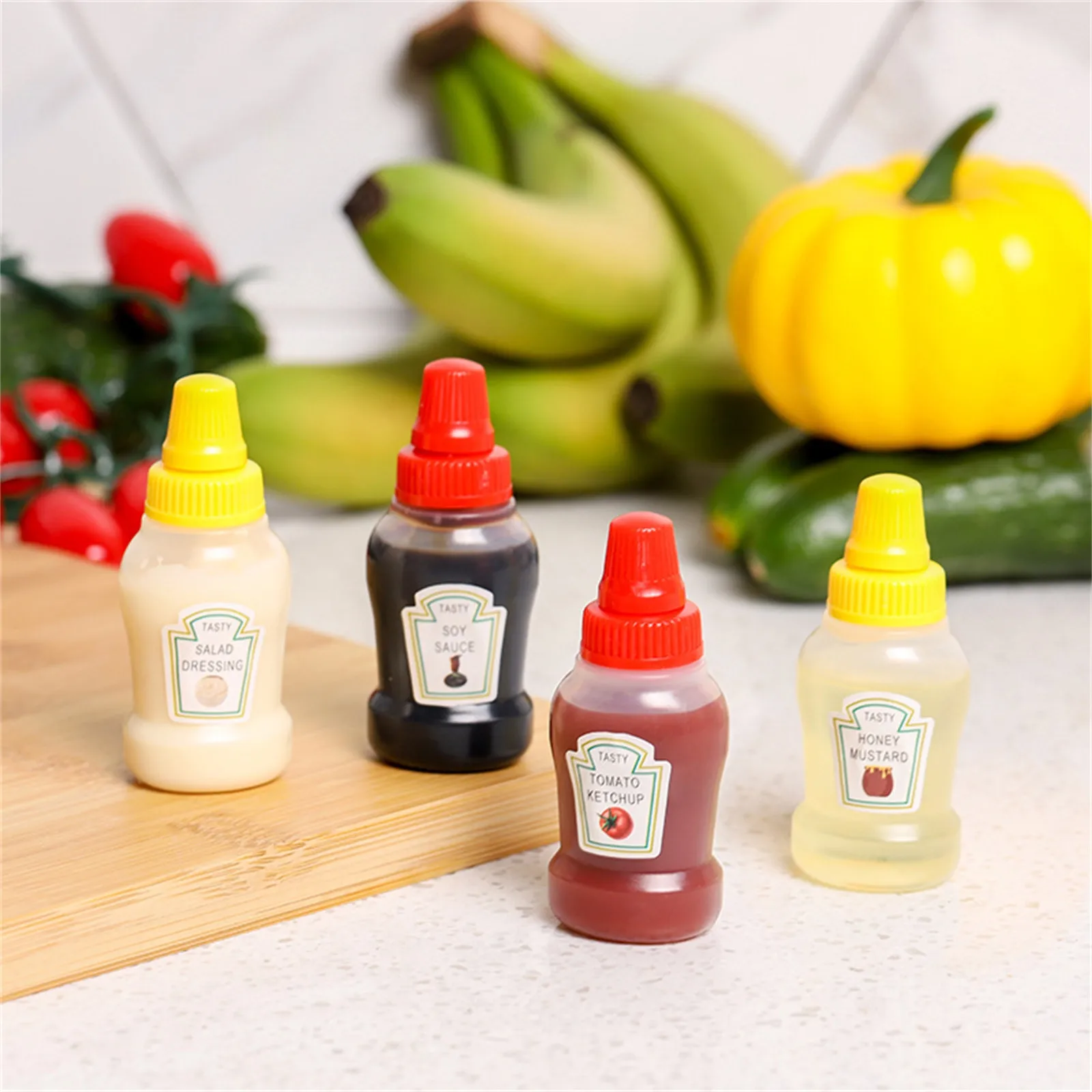

4PC Mini Condiment Squeeze Bottle Cartoon Plastic Tomato Honey Condiment Container Lunch BBQ Box Accessories Sauce Bottles