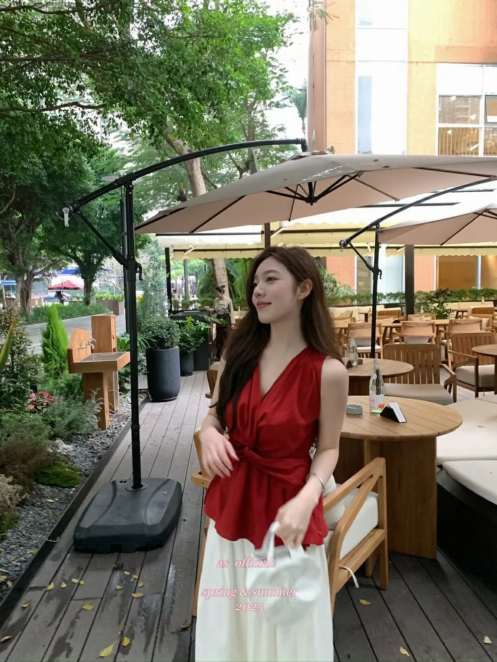 Image of Designer Twist Knot V-neck Vest for Women 2025 Summer New Resort Style Niche Slim-fit Unique Sleeveless Top