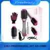 Woman brushing hair brush 2 In 1 Electric Hot Air Brush One Step Professional Salon Hair Styler Electric Ion Blow Dryer Brush 1