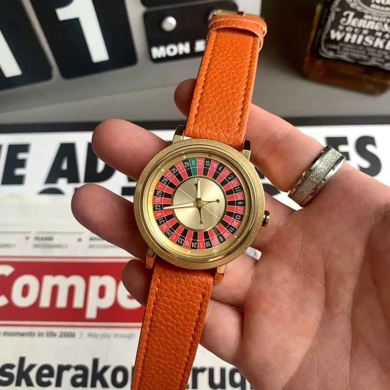 Luxury Gold-Tone Sports Watch with Unique Rotating Dial Design