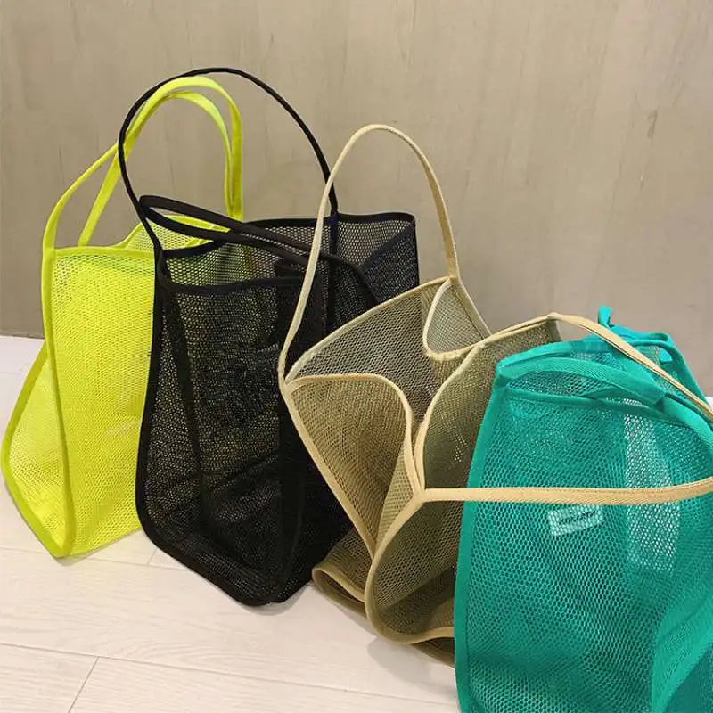 

2022 New Ins Wind Transparent Mesh Shopping Bag Fashion Light and Versatile Large-capacity Portable Shopping Bag Beach Mesh Bag