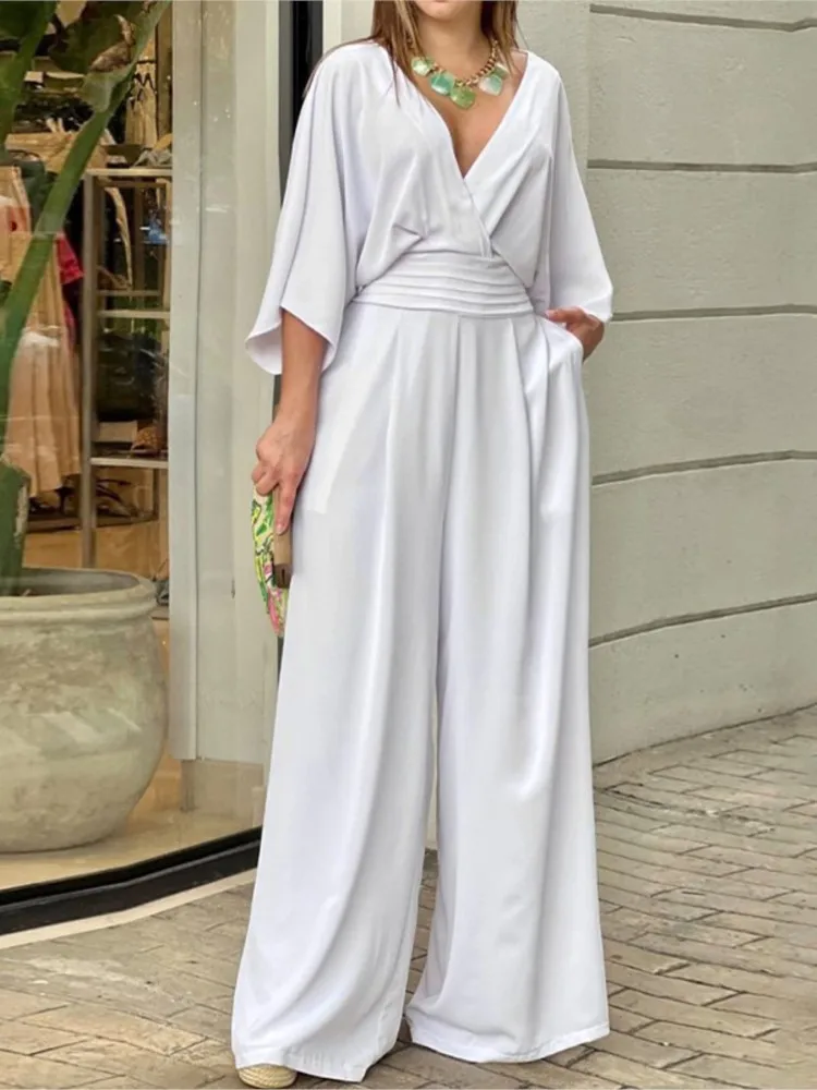

Women Elegant Jumpsuit 2023 Summer Sexy V Neck Solid Bat Sleeve Nipped Waist Loose Casual Wide Legs Pants Romper High Streetwear