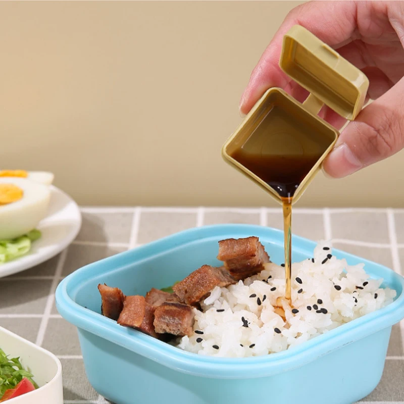 https://ae01.alicdn.com/kf/S15a78479e2974c928db4da3e17bd16533/Salad-sauce-container-small-flavoring-container-with-lid-reusable-sauce-container-lunch-lunchbox-children-s-leak.jpg