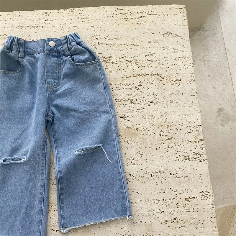 

Spring new Kids Pants solid color loose ripped jeans Girls fashion casual denim Trousers