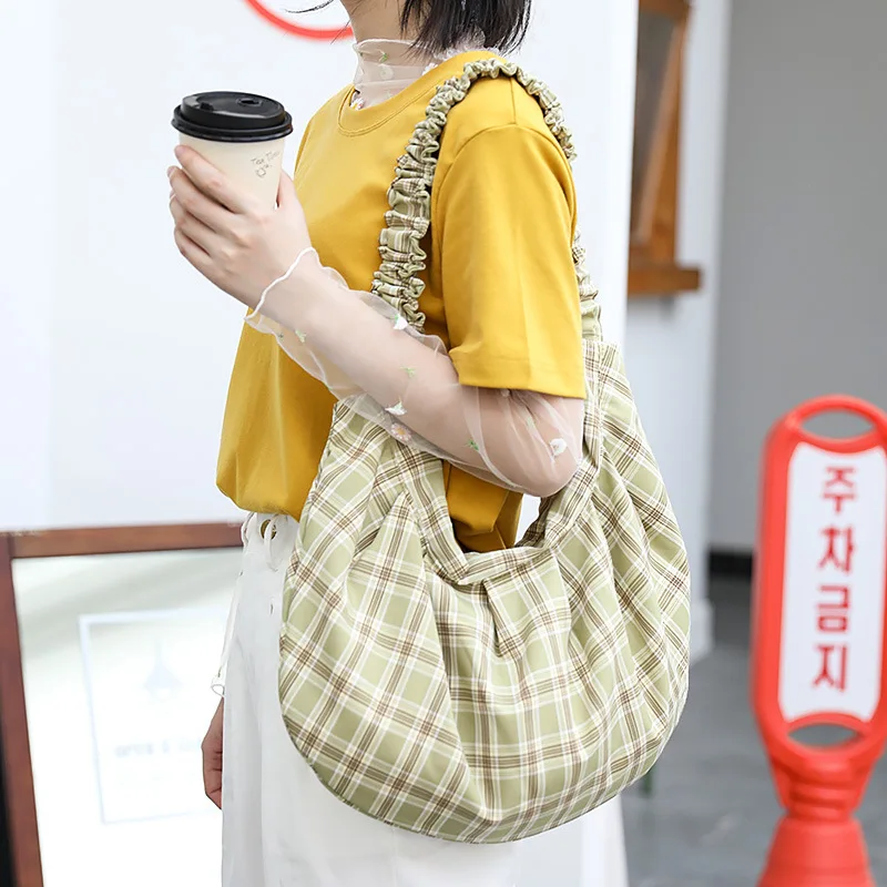 

Korean version casual canvas handbag net red small fresh checked dumpling bag simple art retro pleated shoulder bag