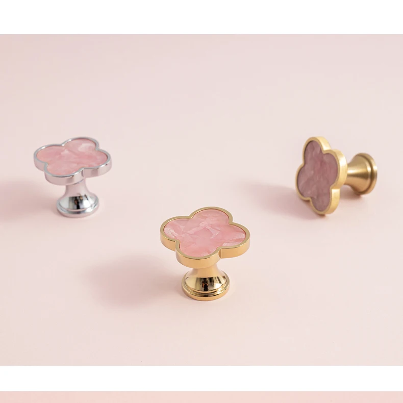 brass knob used as wall hook bathroom clothes hanger