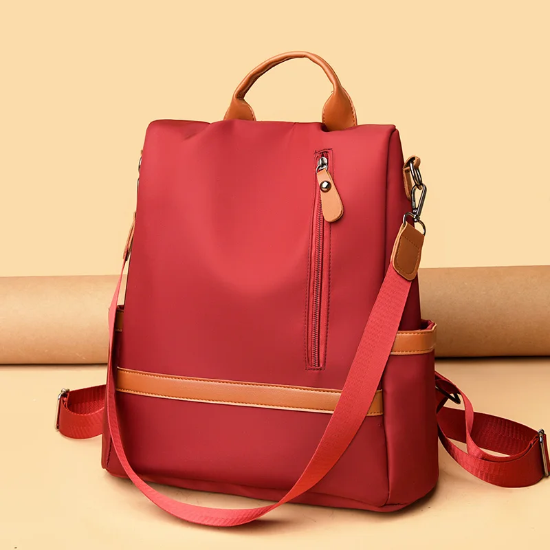 Women's fashionable black Oxford backpack, a versatile and spacious day bag suitable for travel, school or leisure outings, trav