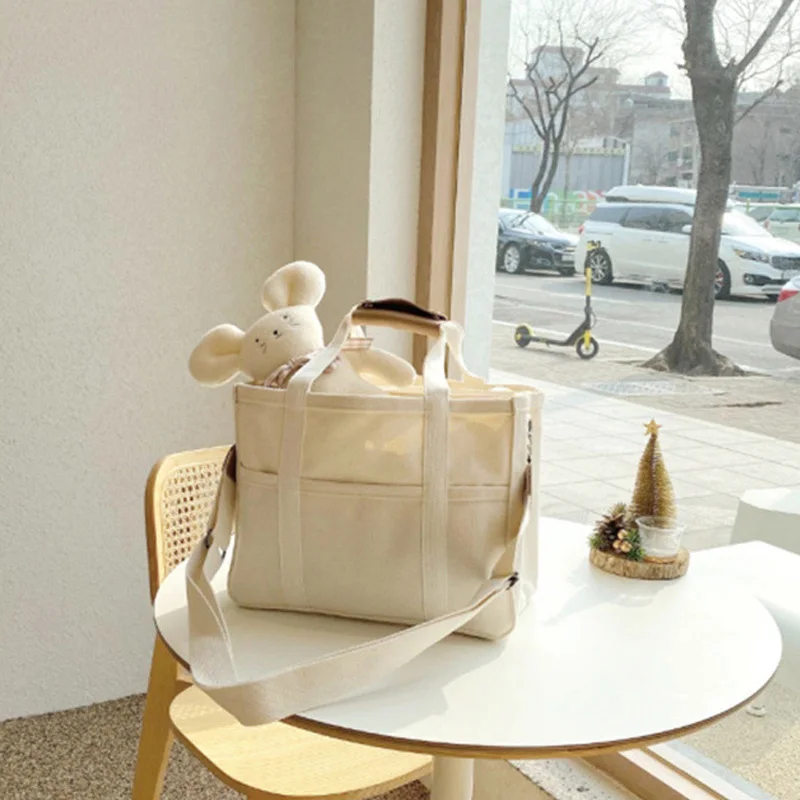 

ZK50 Baby One Shoulder Multifunctional Large Capacity Mother Handbag Baby Canvas Storage Bag Hanging Bag Diaper Bag