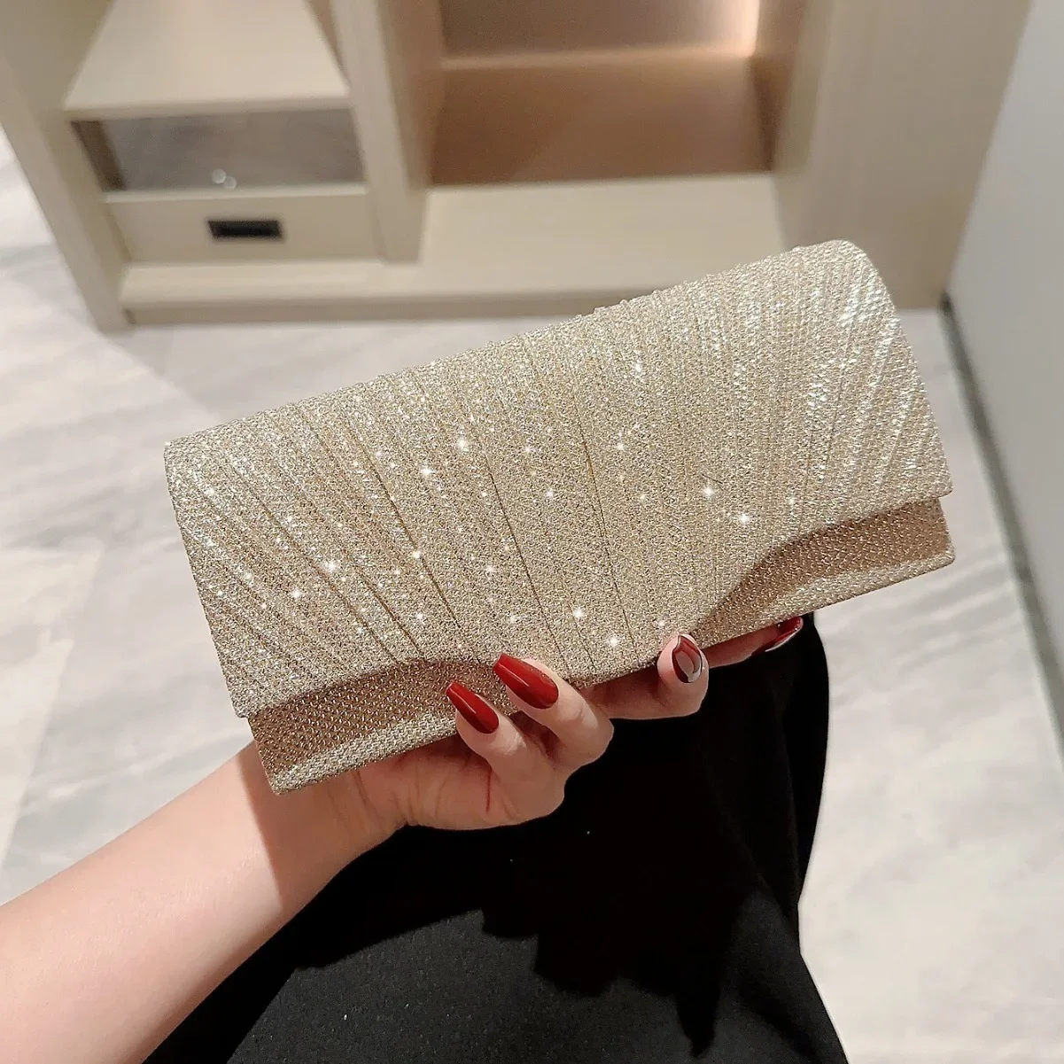 Gouden Glitter tassen koop je online bij de Bijenkorf