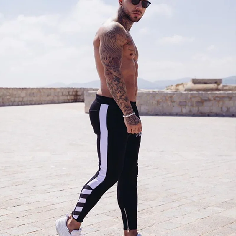 Men's Muscle Fitness Casual Sports Running Training Pants Autumn/Winter Small Footwear One Piece Agent