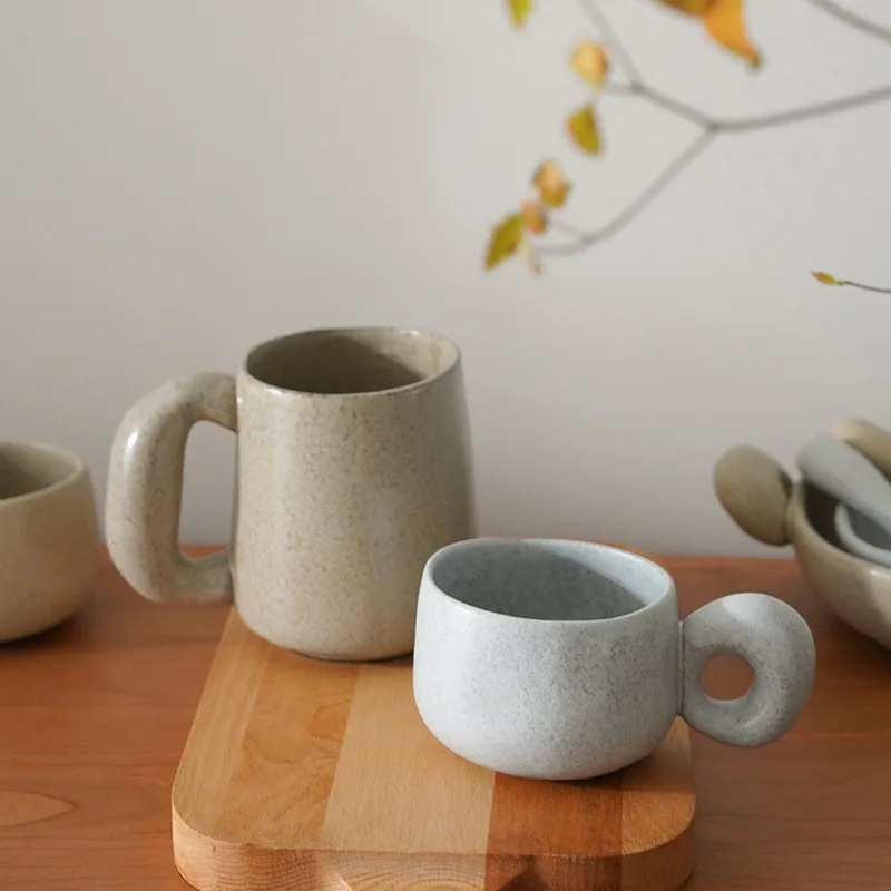 https://ae01.alicdn.com/kf/S164a144335294ff1a4f51a35385994dbI/Beige-Ceramic-Mugs-Cute-Coffee-Cup-Nordic-Home-Decor-Handmade-Art-Milk-Tea-Cup-Home-Drinkware.jpg